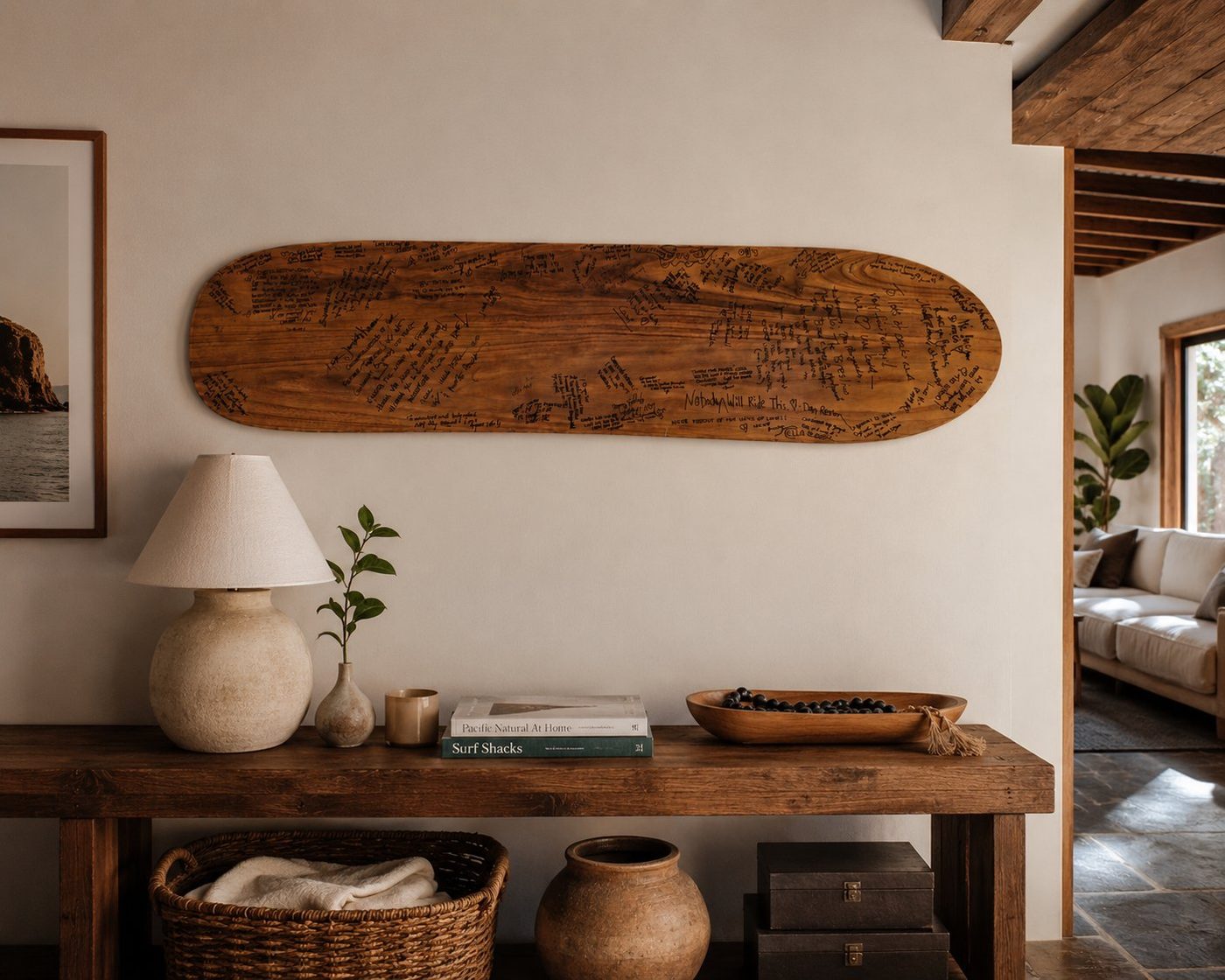 Signed alaia wedding guest book displayed as wall art in a beautiful home